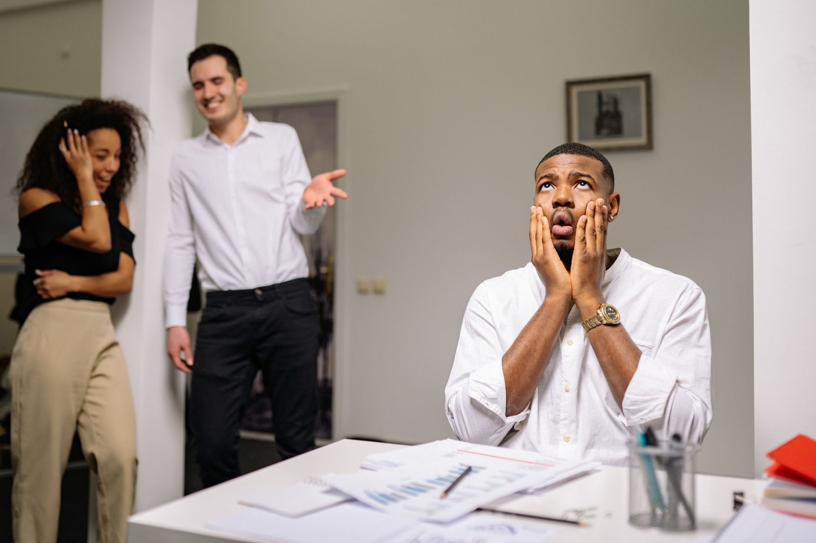 A UK worker reviewing an unfair dismissal claim with a clock